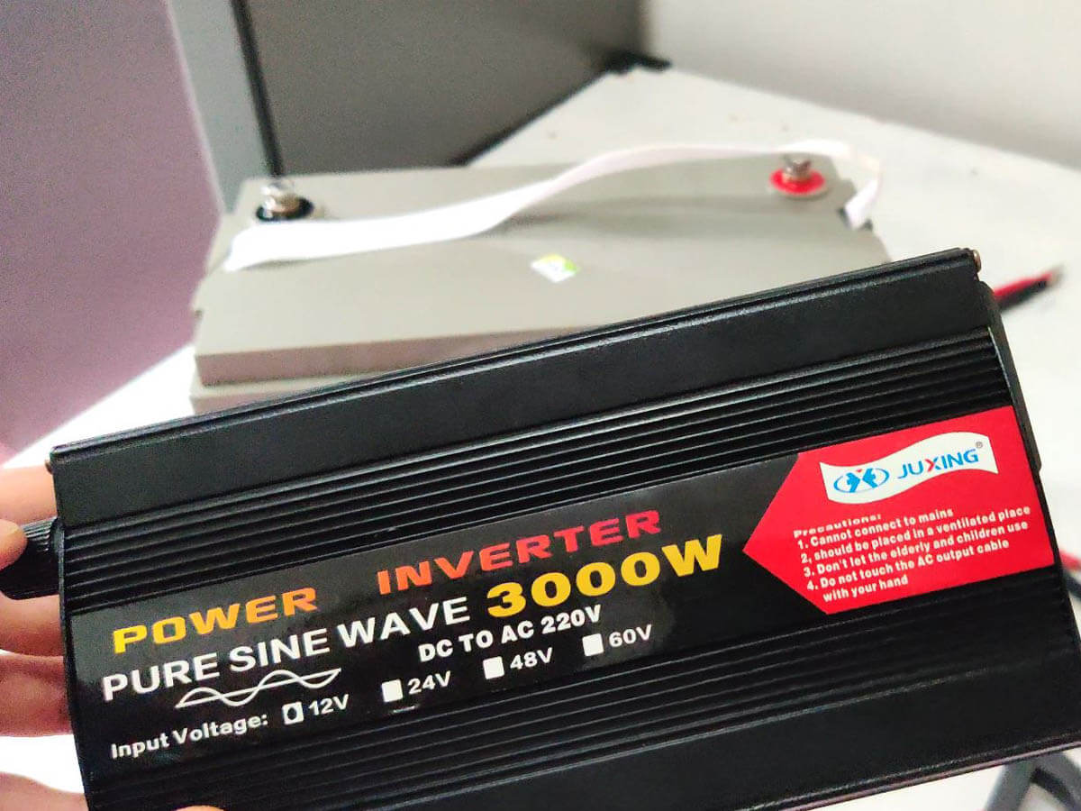 Since refrigerators like this one use AC (Alternating Current) power, and batteries only supply DC (Direct Current) power, I had to connect the fridge to the battery via a power inverter. This particular inverter was a Pure Sine Wave inverter with a Continuous Wattage rating of 500 Watts.