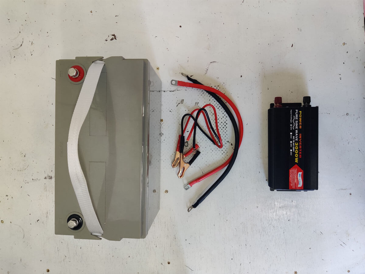 To run your refrigerator on a battery, you need a battery, a power inverter, and cables to connect the inverter to the battery.
